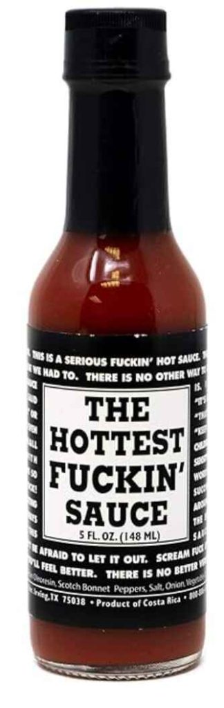 a bottle of hot sauce with words written all over the label